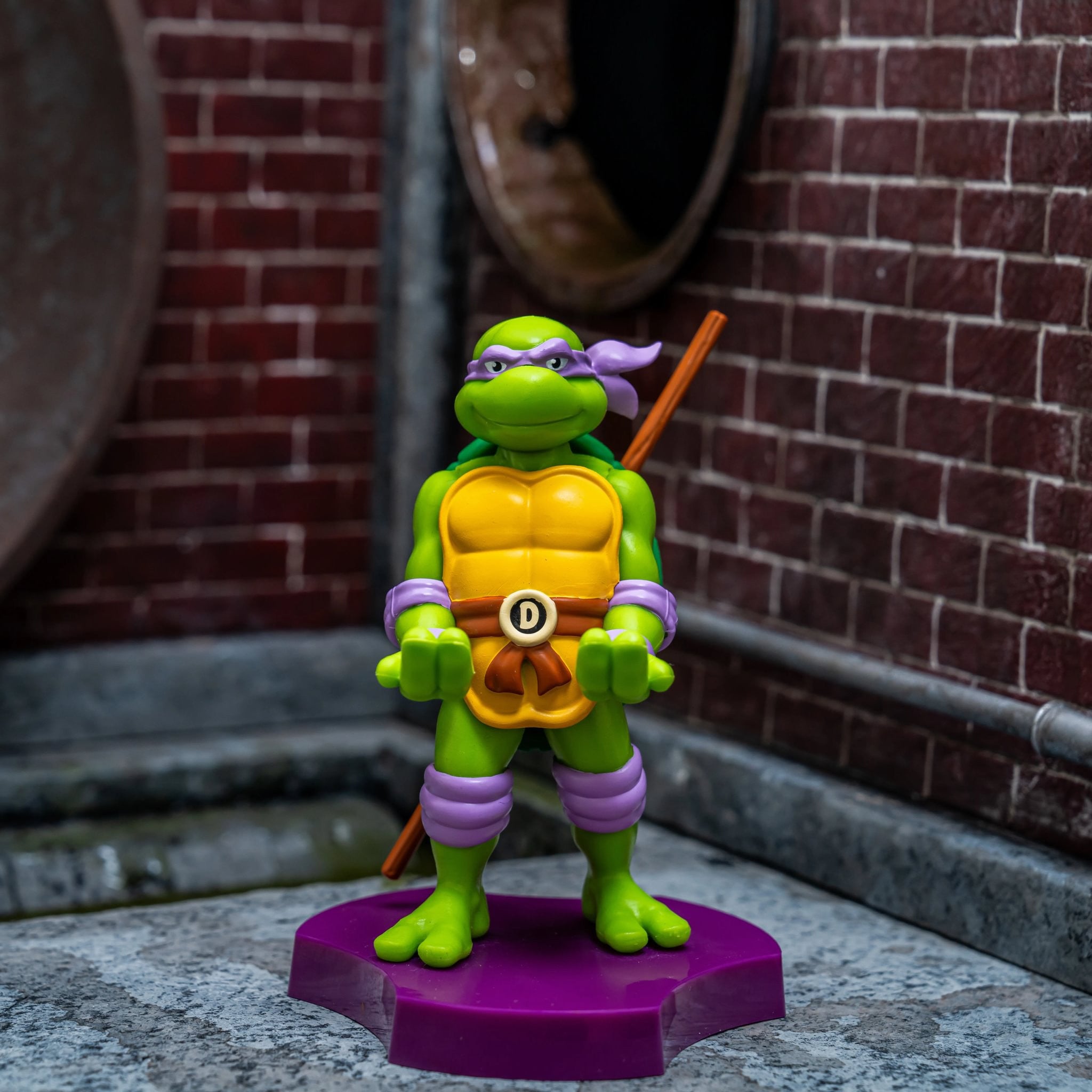TEENAGE MUTANT NINJA TURTLE - HOLDEM - CHARGING HOLDER - DONATELLO 11CM